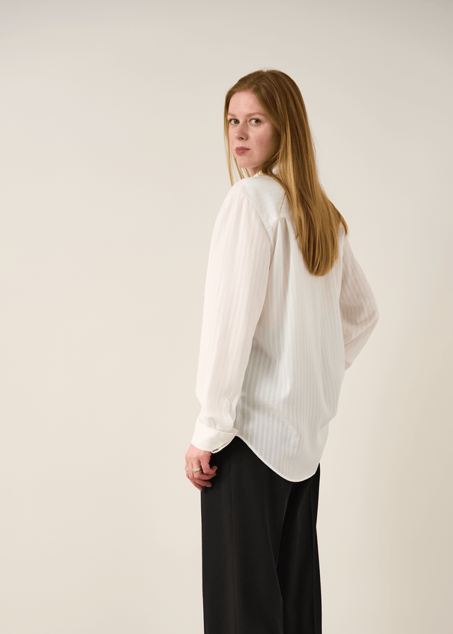Back view showing elongated sleeves on tall women’s relaxed TENCEL™ shirt